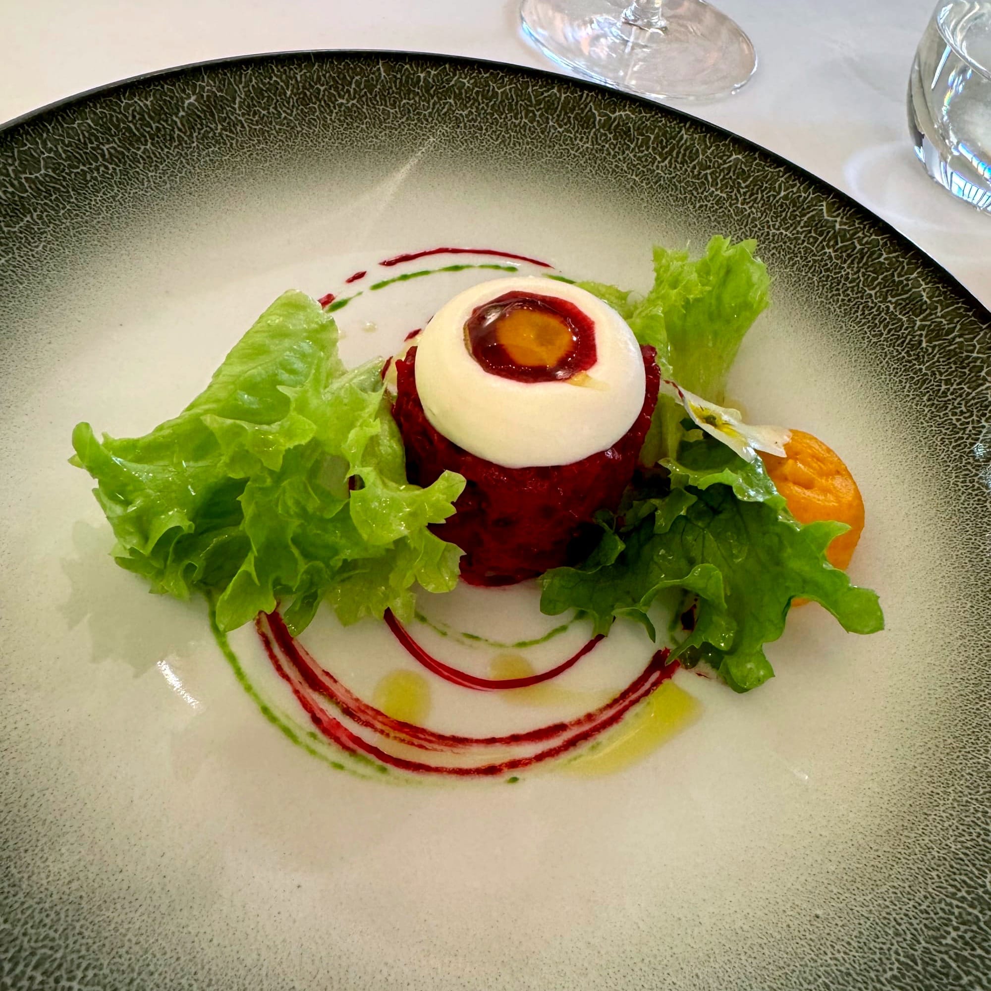 Beetroot and herb salad with a light dairy emulsion — one of Passard’s precise, garden-driven compositions. at Arpege Paris